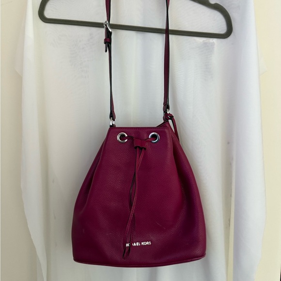 Michael Kors Handbags - Pre Owned Michael Kors Burgundy Crossbody Bucket Bag